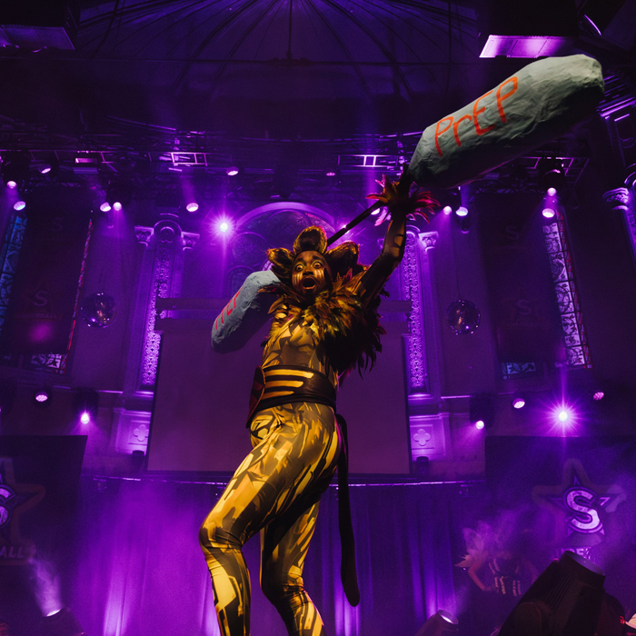 Eliane performing as Erik the Dragking as part of her HIV dragtivism..