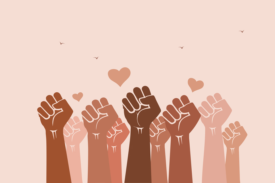 Illustration of fists raised with hearts surrounding.